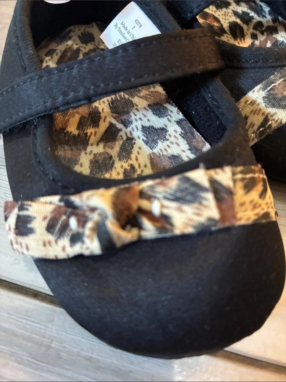 🖍️ First Impressions Black Baby Mary Jane Shoes with Leopard Bow